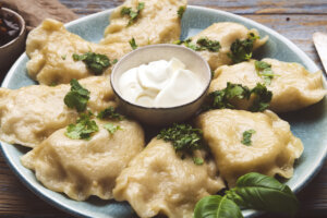 Mashed potato stuffed dumplings with cream