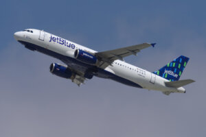 jetBlue Airways Airbus A320-232 jet with registration N591JB shown airborne.