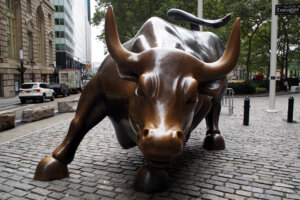 Charging Bull, aka the Wall Street Bull, bronze sculpture by Arturo Di Modica, installed on current location in 1989, on Broadway at Bowling Green, New York
