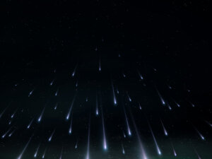 Starfall on a black background. Fireballs in the sky. Beautiful meteor shower against the background of stars